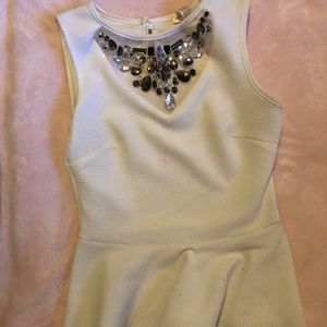 Peplum stone top